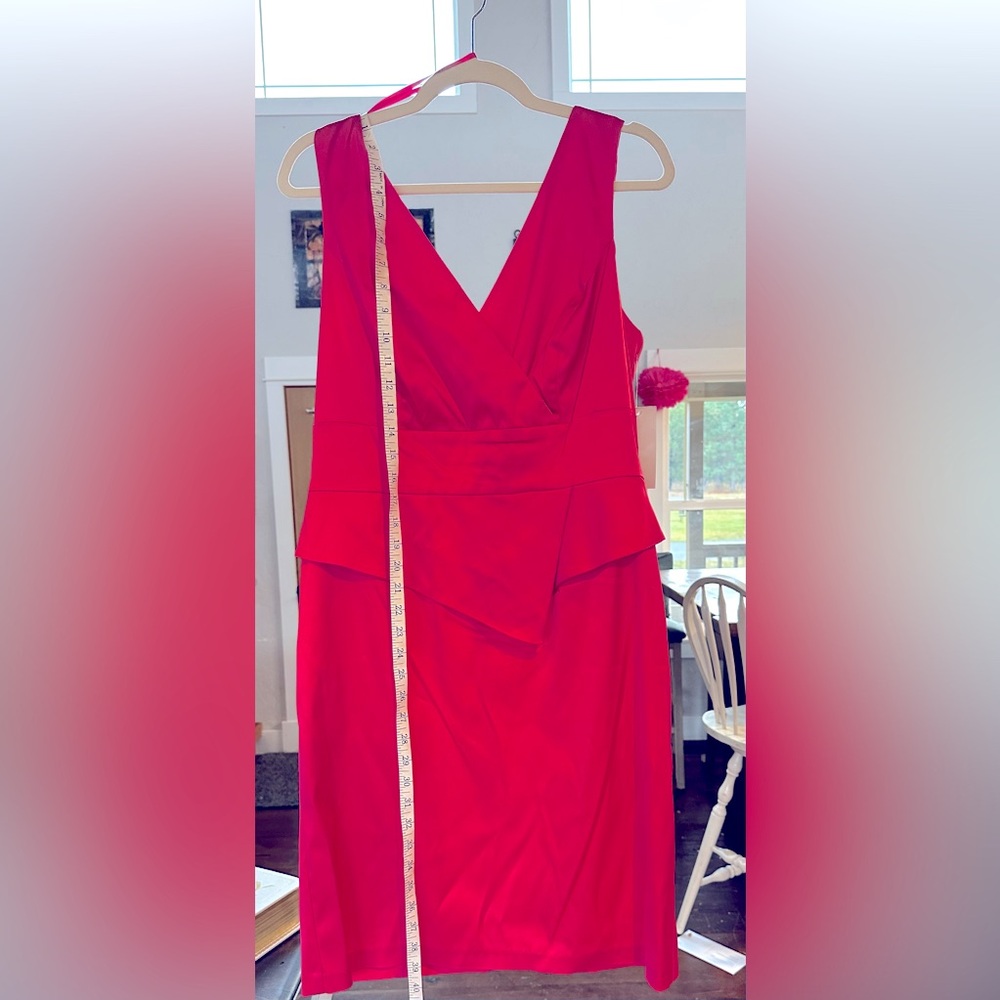 This is a hot pink dress never been worn midi. Size 14